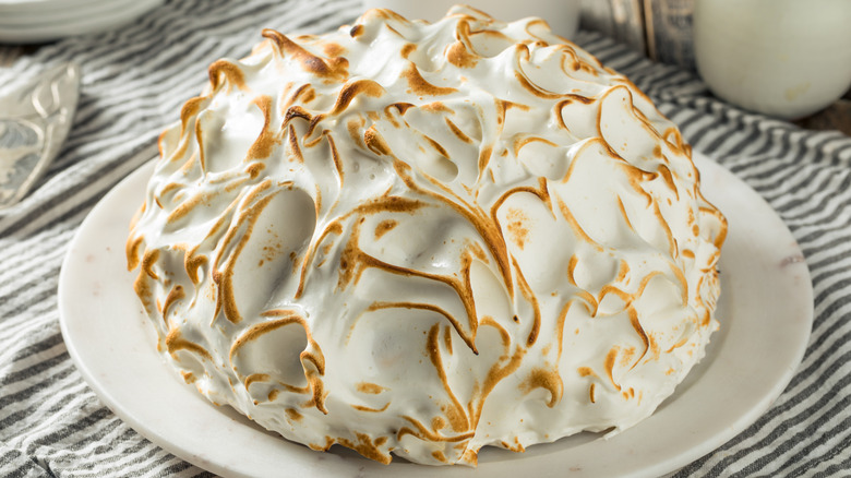 plate of baked alaska on striped dish towel