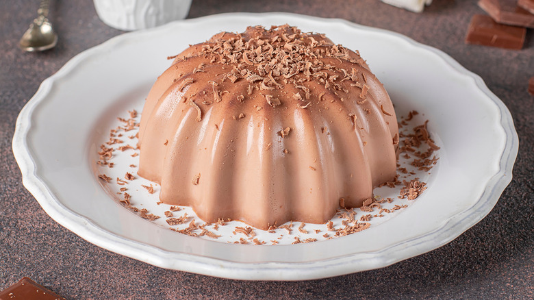 plate of blacmange with chocolate shavings
