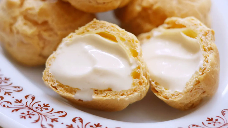 Cream puffs cut open