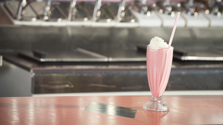strawberry milkshake on 1950s diner counter