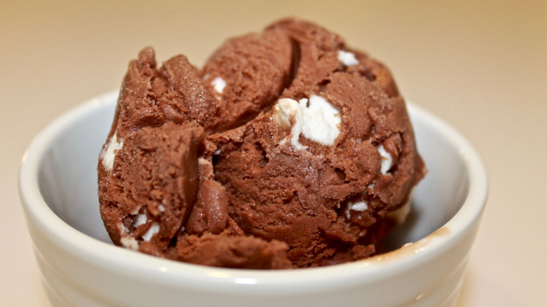 Scoop of chocolate ice cream with marshmallows