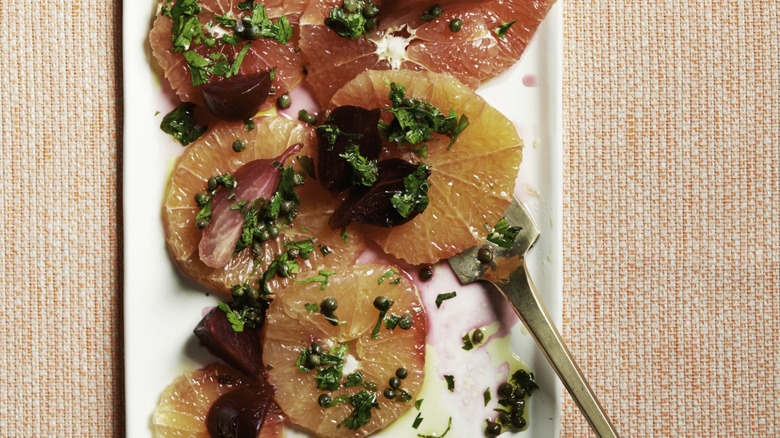 Citrus fruit salad with beets on a plate