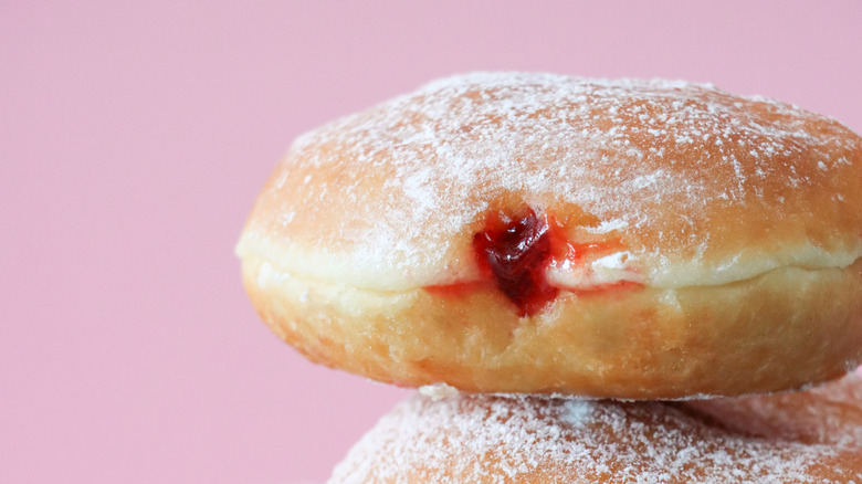 Homemade jelly donuts in a stack