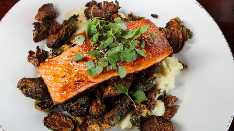 Pumpkin spiced glazed salmon over root vegetables