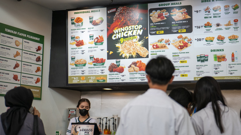 Customers lining up for service at a Wingstop outlet