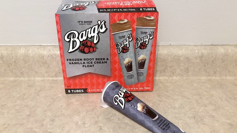 Barq's root beer and vanilla ice cream floats box and tube on neutral background.