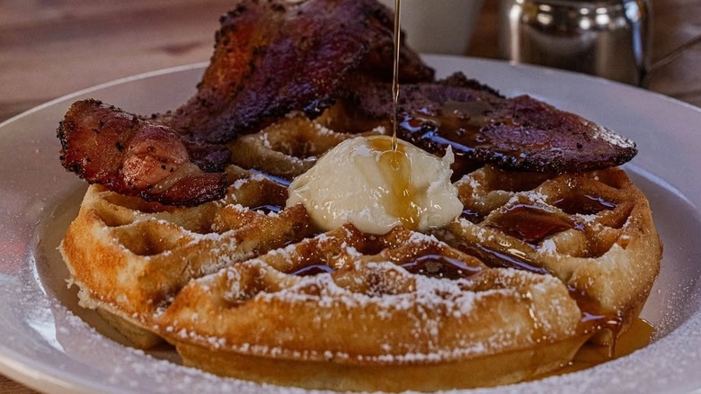 Plate of waffles and bacon at Matt's Big Breakfast