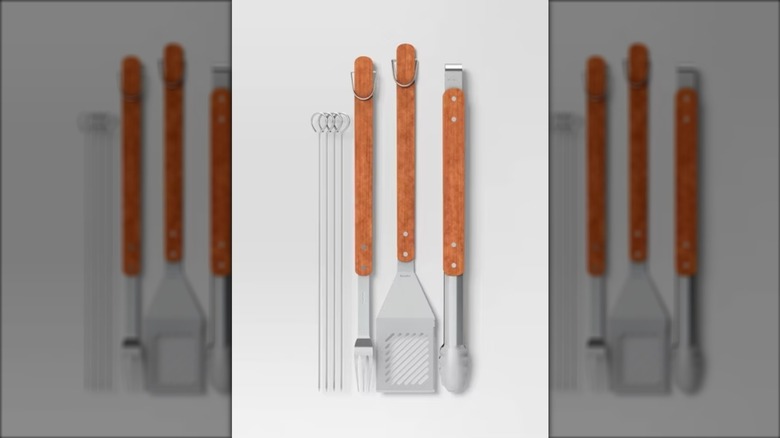 Room Essentials 7-piece stainless steel grill tool set with skewers, grill fork, spatula, and tongs