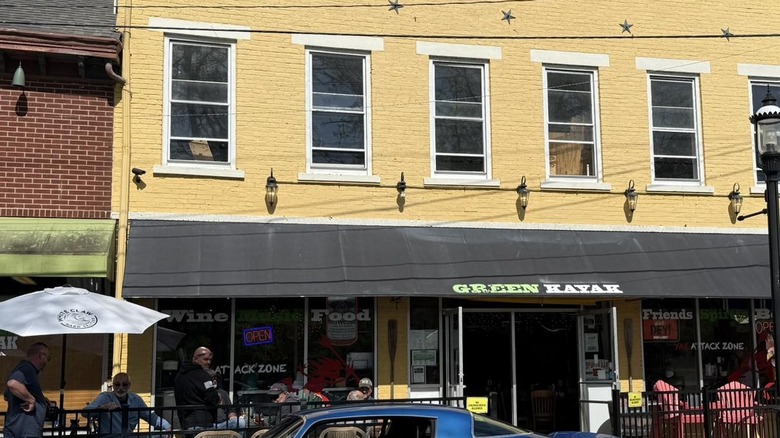 Green Kayak front exterior during day