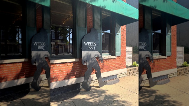 Webb's bigfoot sign by front entrance