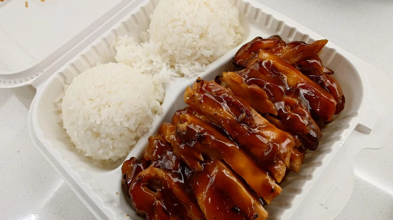 Takeaway container of teriyaki chicken and rice from Rainier Seattle