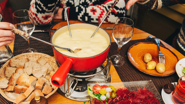 Cheese fondue on restaurant table
