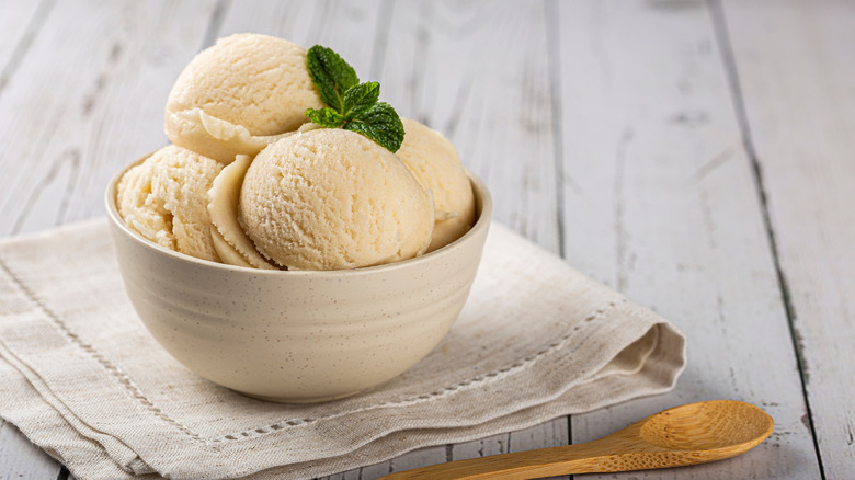 Scoops of vanilla ice cream in bowl