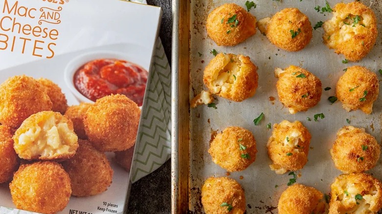 Box of Trader Joe's Mac and Cheese Bites next to baked bites on tray