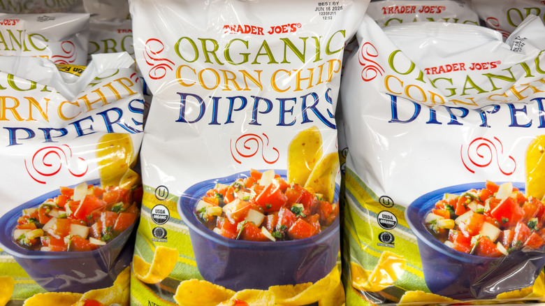 Bags of Trader Joe's Organic Corn Chip Dippers on store shelf