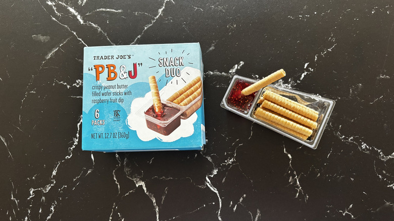 Trader Joe's PB&J snack duo box next to PB&J snack duo container