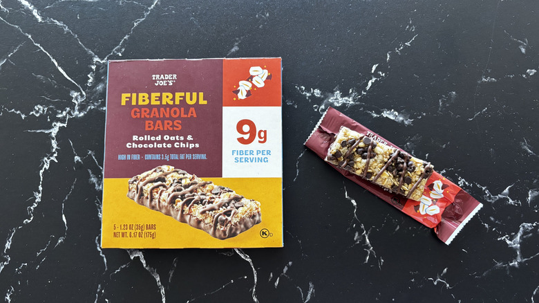 Trader Joe's fiberful granola bars box next to unwrapped granola bar