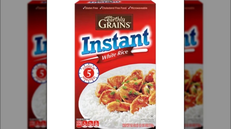 A box of Earthly Grains Instant White Rice isolated on a white background