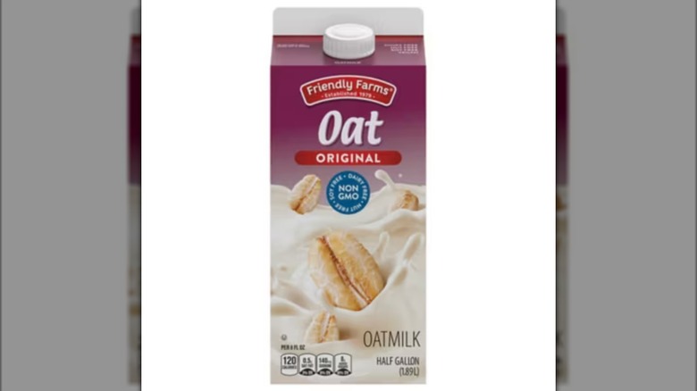 A container of Friendly Farms Oat Milk isolated on a white background