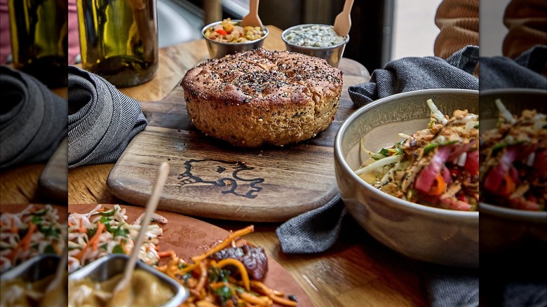 Artisan bread on table with dips and spreads
