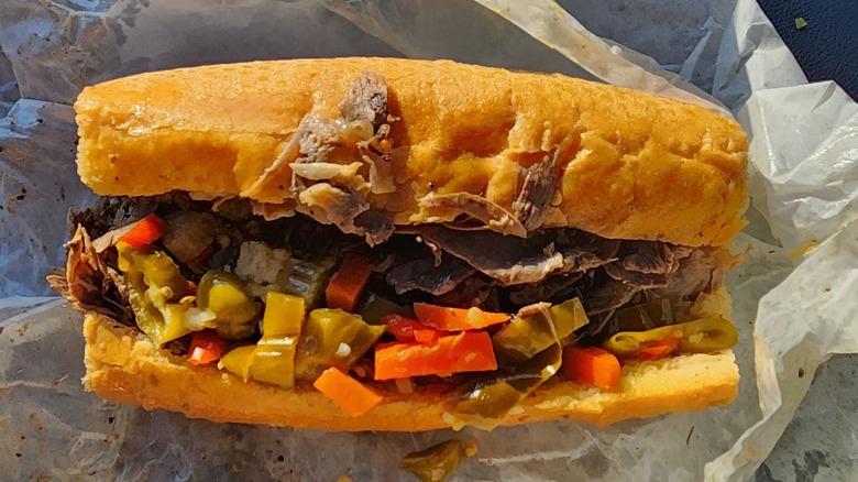 Italian beef sandwich on paper from Johnnie's