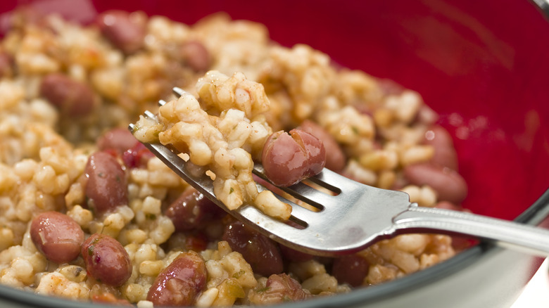 Close-up of a forkful of rice and beans.