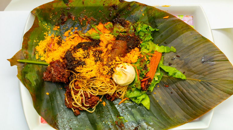 Waakye in banana leaf
