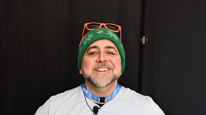 Duff Goldman with stocking cap and orange sunglasses on head