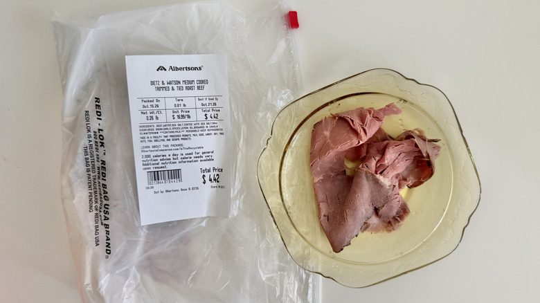 A slice of Medium Cooked Trimmed & Tied Roast Beef on a plate