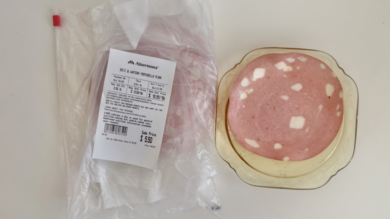 Round slice of Mortadella on a plate