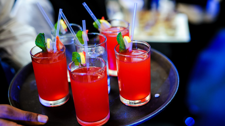 Bright red specialty shots on a tray