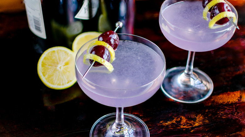 Aviation cocktails with cherries and lemon