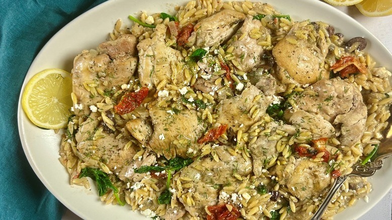 Lemon chicken and orzo on serving plate
