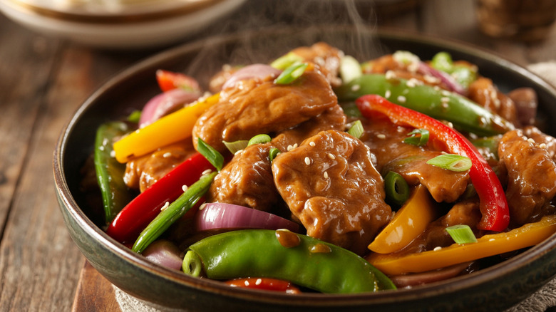 Seitan stir fry with peppers and snow peas