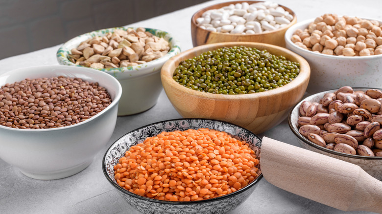 Mixed dried pulses measured out into bowls