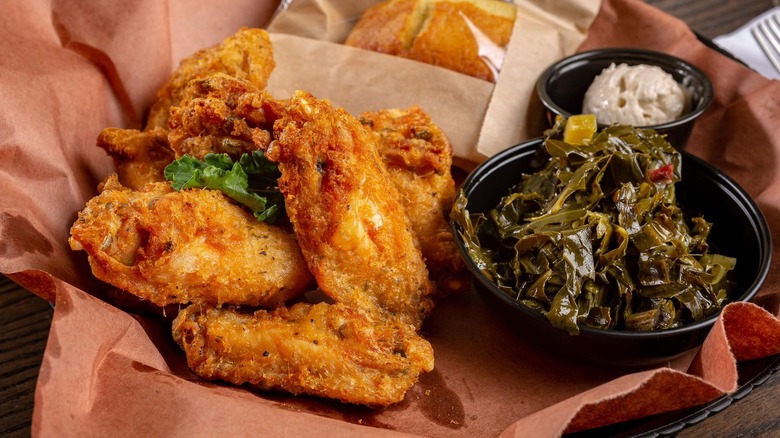 Chicken wings and collard greens from Geneva's Famous Chicken and Cornbread Co.