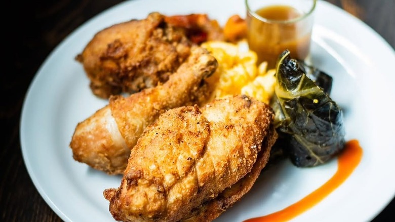Southern marinated fried chicken plate from Twisted Soul Cookhouse & Pours