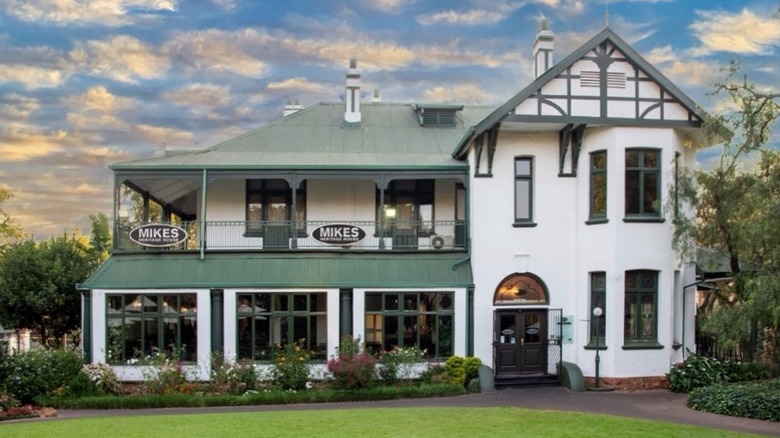 Exterior of Mike's Heritage House on a cloudy day