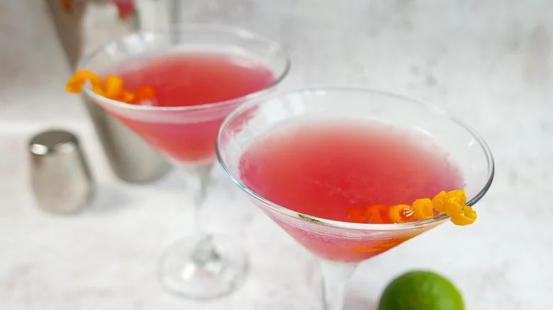 Two Cosmopolitans with orange twists