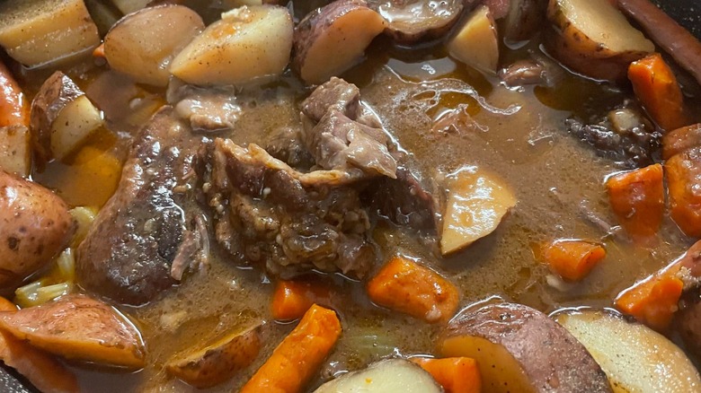 Close up of Creole beef daube with carrots and potatoes