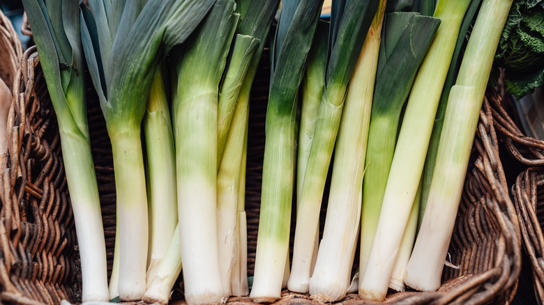 Basket of leeks selling in vegetable market