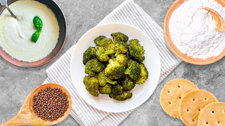 Ingredients surrounding roasted broccoli