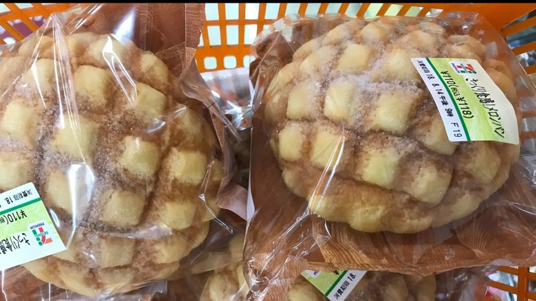 Multiple loaves of 7-eleven melon bread in a shopping basket
