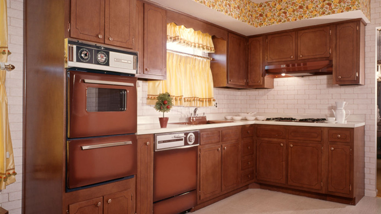 1970s kitchen with wood cabinets