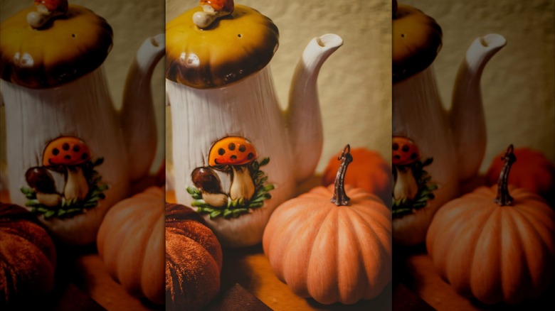 vintage mushroom teapot on a side table