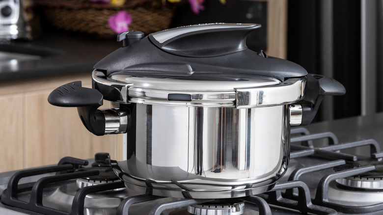 Pressure cooker on stove