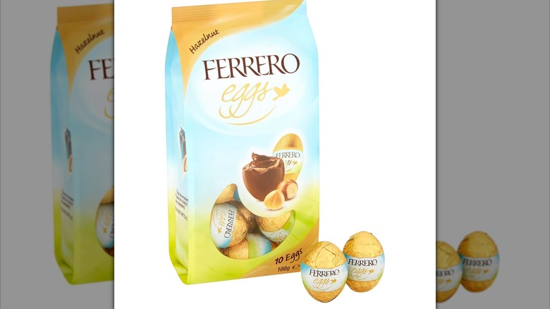 Blue and gold bag of Ferrero Hazelnut Eggs candies with two gold foil wrapped eggs