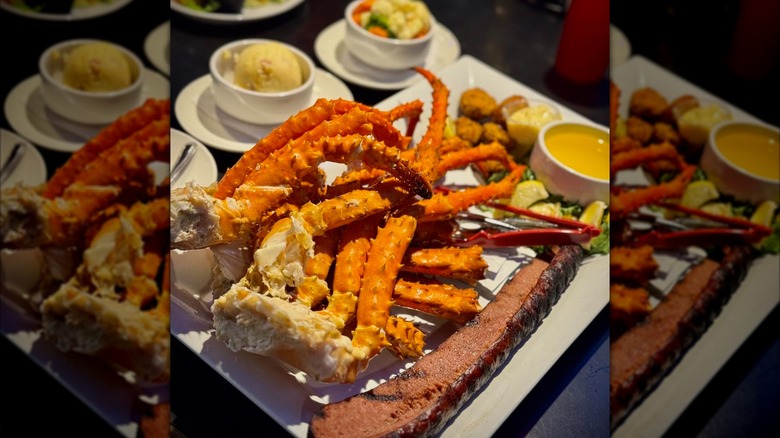 Kodiak Arrest challenge with crab legs, sausage, and sides
