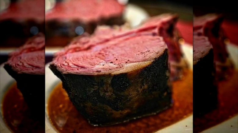 Massive piece of prime rib on plate