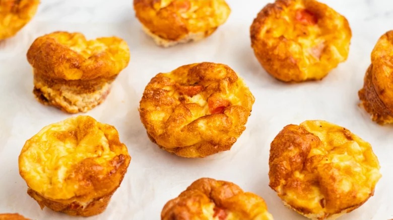 Mini quiches on parchment paper